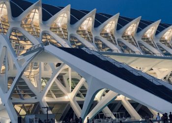 Striking modern architecture of Valencia's Science Museum at dusk.