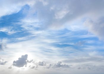 Tranquil blue and white cloudscape above Kapaa with light soft clouds.