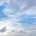 Tranquil blue and white cloudscape above Kapaa with light soft clouds.