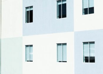 white and gray concrete wall with windows