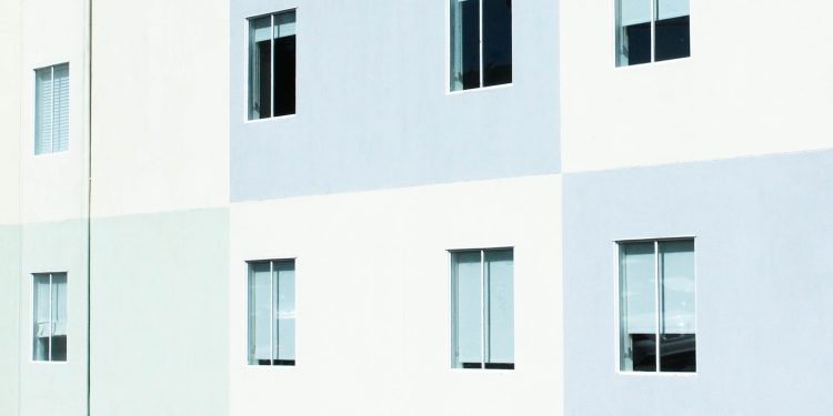 white and gray concrete wall with windows