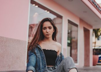 woman sitting on ground