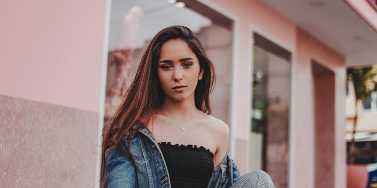 woman sitting on ground