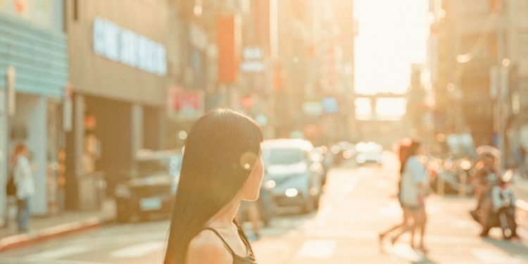 woman standing on road