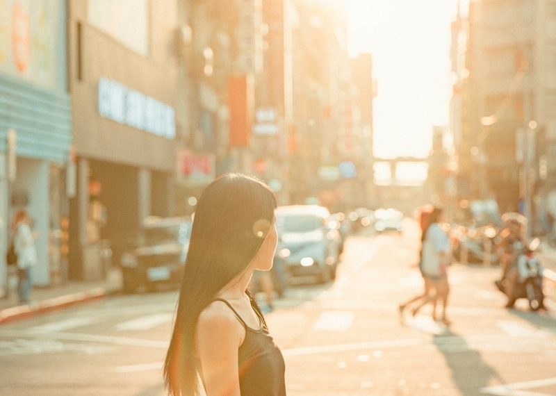 woman standing on road