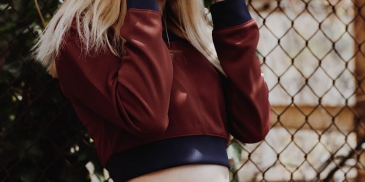 women holding camera taking a picture